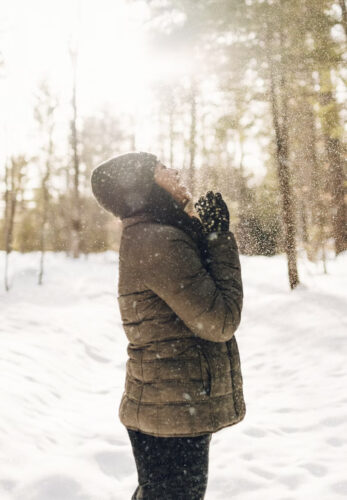 woman snow puffer brown jacket