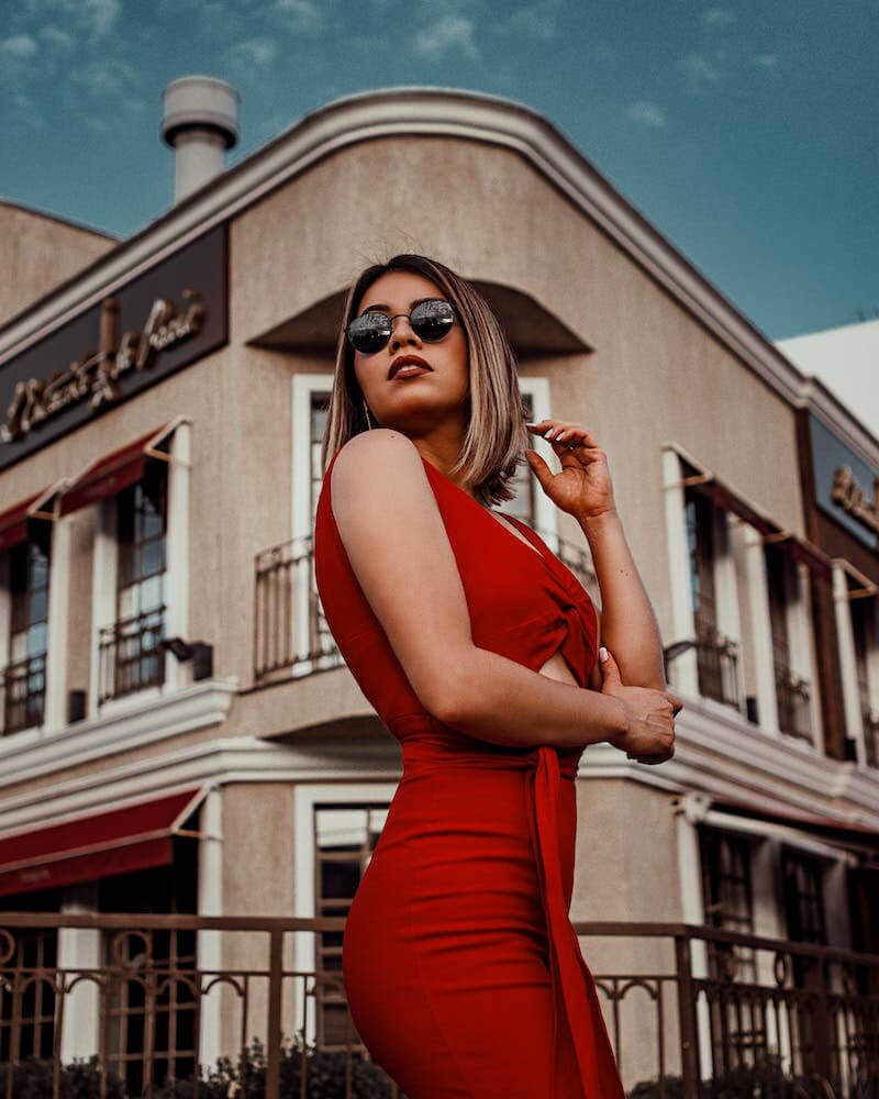 red dress woman in sunglasses
